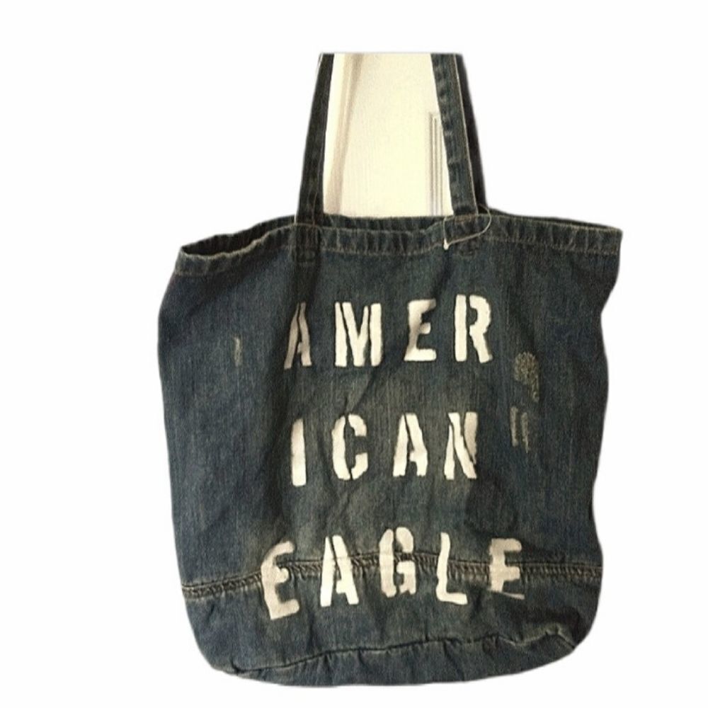 AMERICAN
EAGLE distressed denim bag